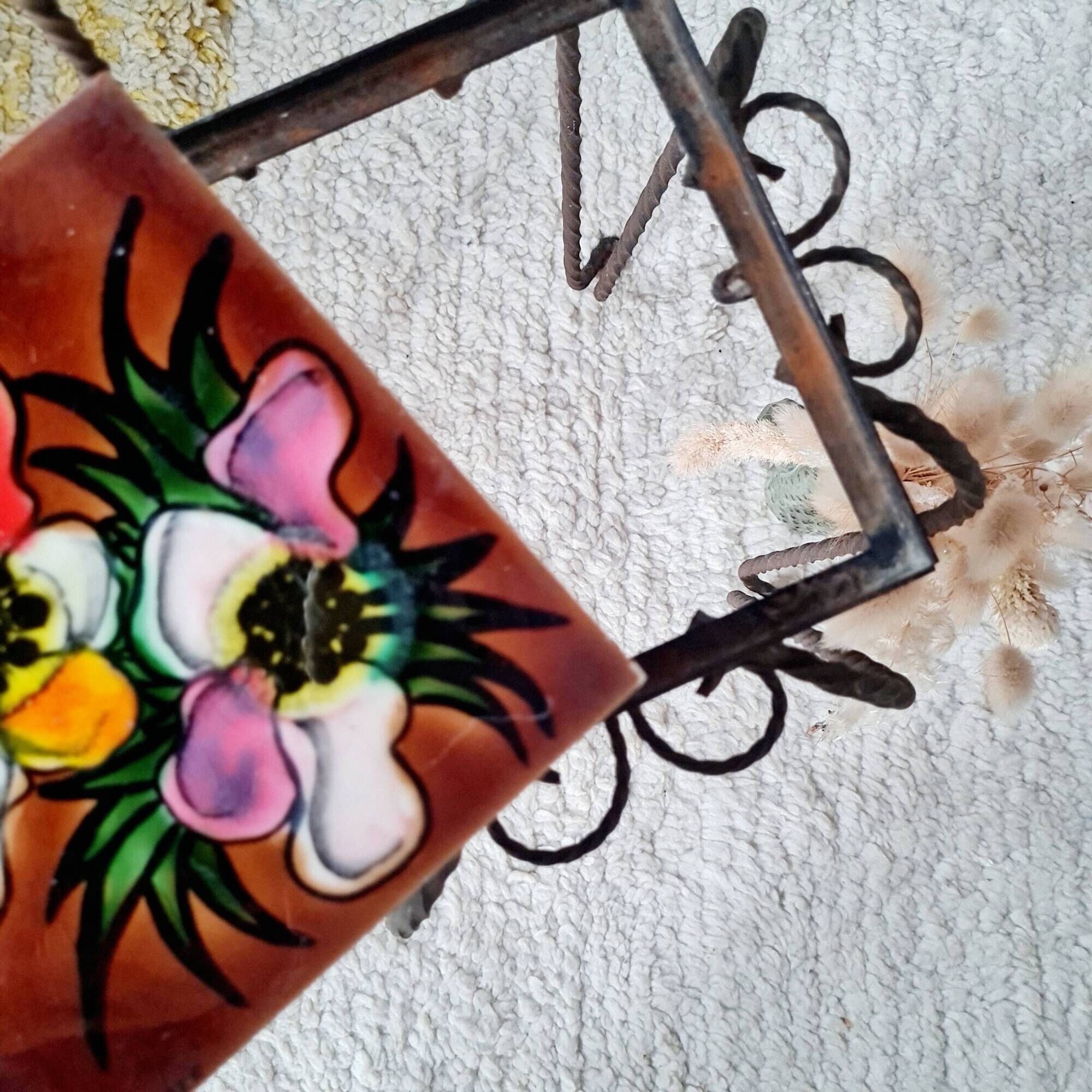 Small chair / stool in twisted wrought iron and floral ceramic.
