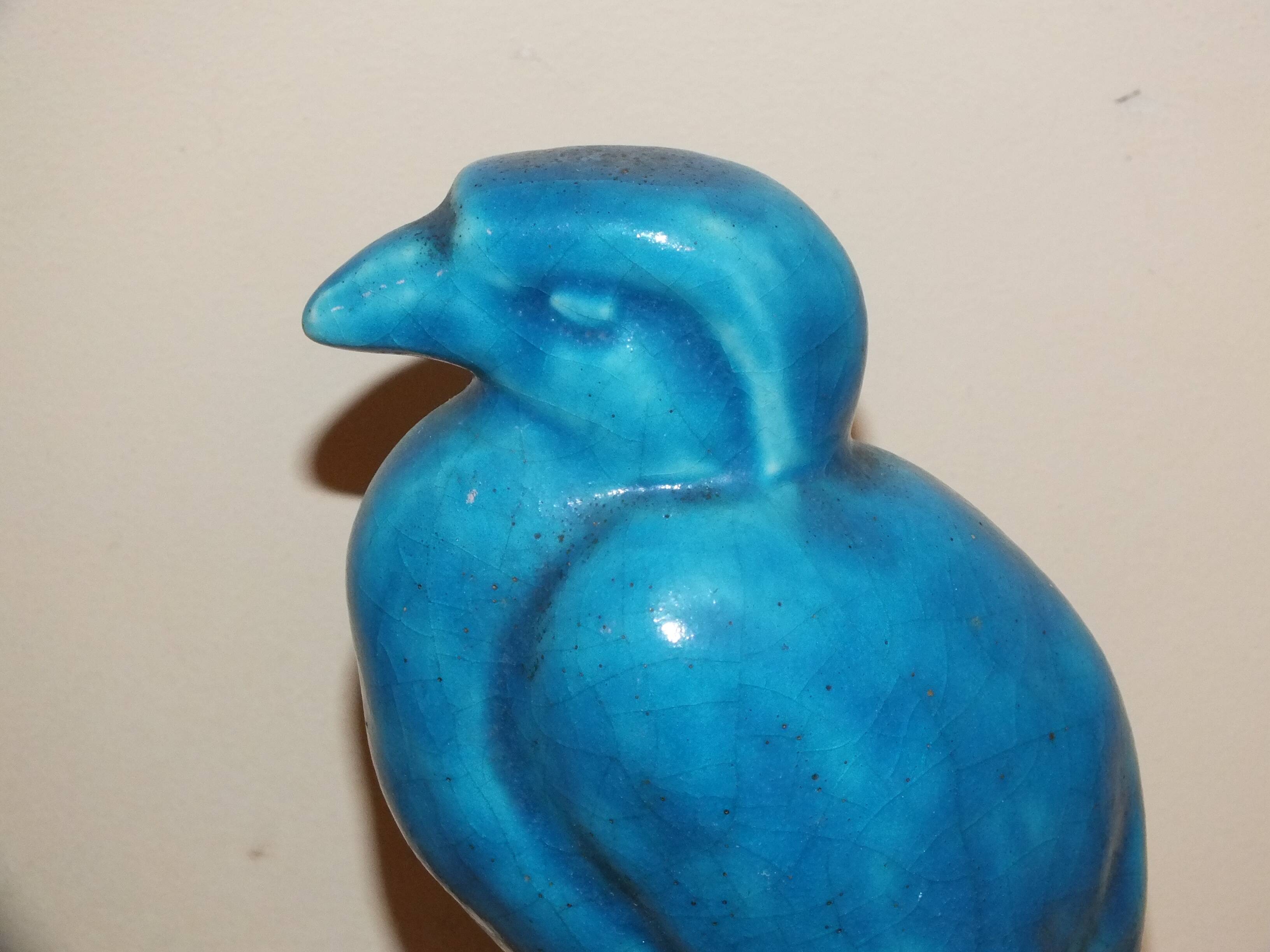 Bird, cracked blue raptor in ceramic