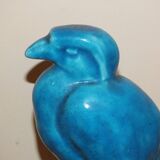 Bird, cracked blue raptor in ceramic