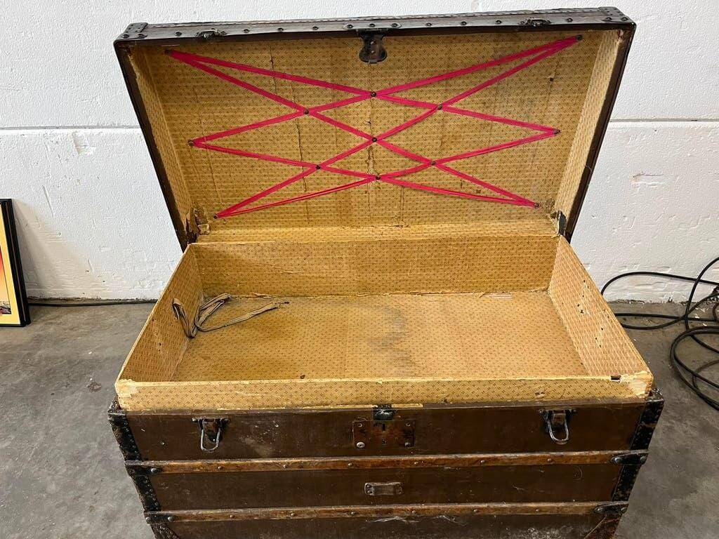Vintage wooden coffee table with iron fittings.