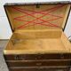 Vintage wooden coffee table with iron fittings.