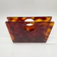 Lucite magazine rack "tortoiseshell", 1970s