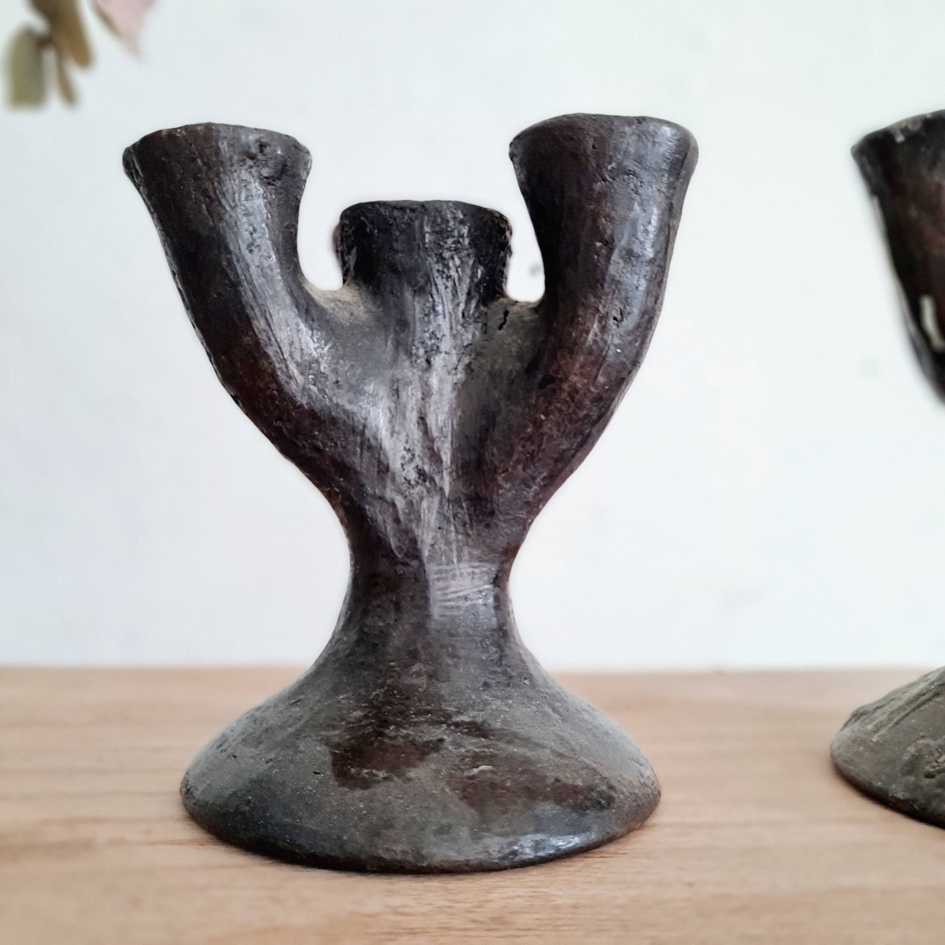 Antique terracotta candlesticks