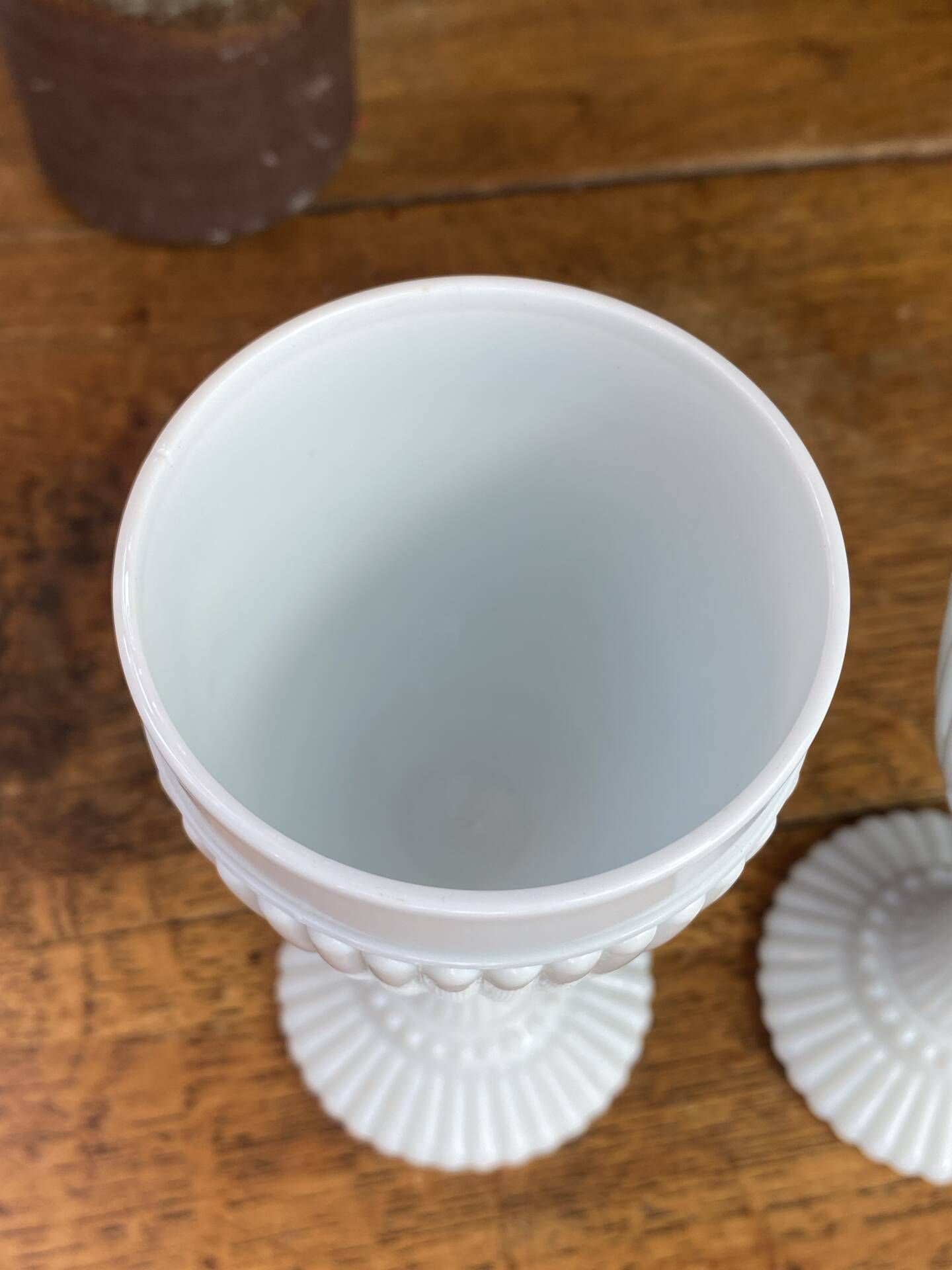 Footed glasses, white opaline chalices