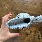 Curious ceramic pitcher