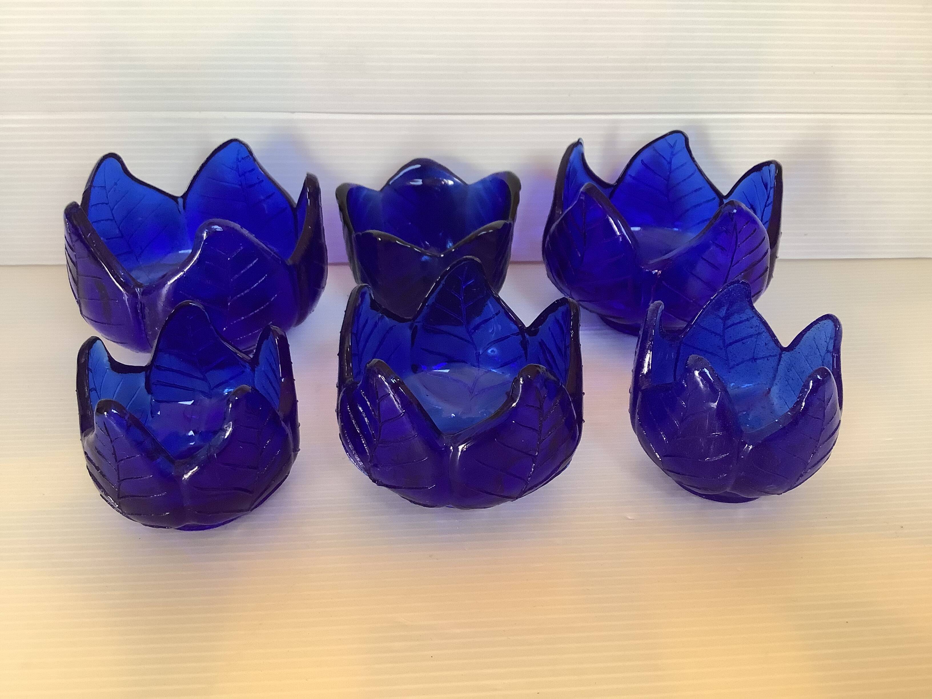 Six stackable cobalt blue candlesticks