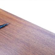 Vintage 1950s teak desk by designer Jacques Hauville.