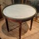 Coffee table with a marble top, known as "bouillotte".