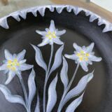 Black ceramic plate from the 60s