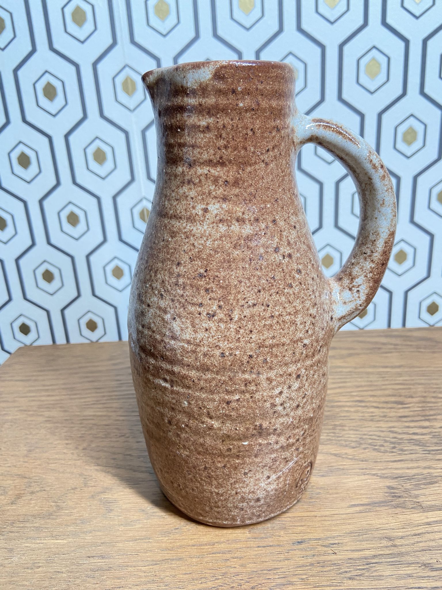 Sandstone pitcher signed Jeanne and Norbert Pierlot