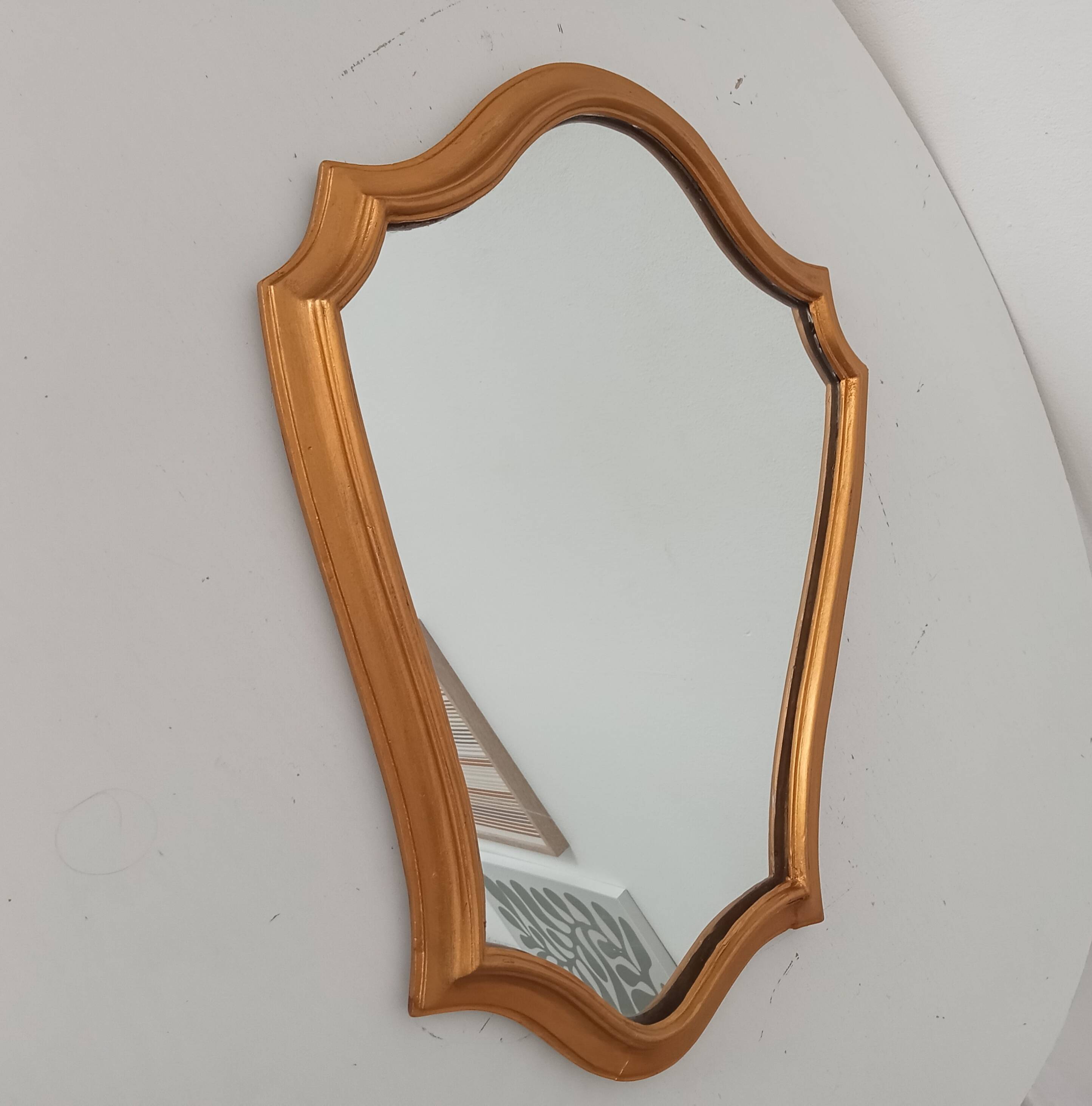 Vintage baroque mirror in gilded wood