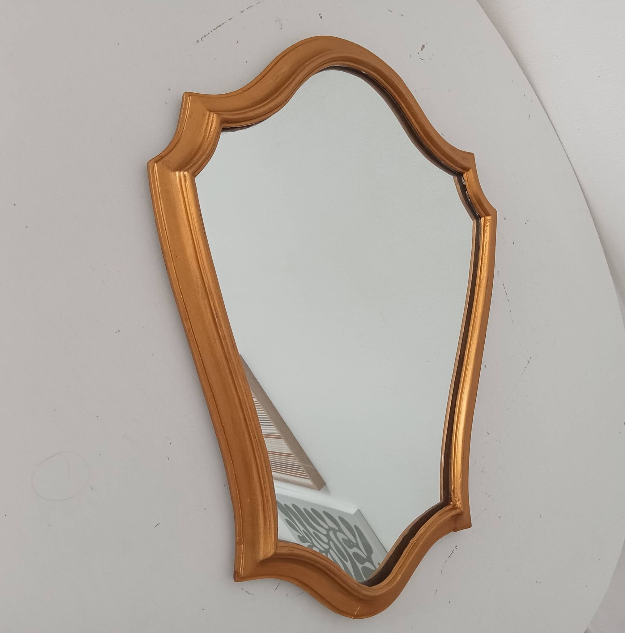 Vintage baroque mirror in gilded wood