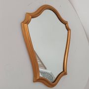 Vintage baroque mirror in gilded wood