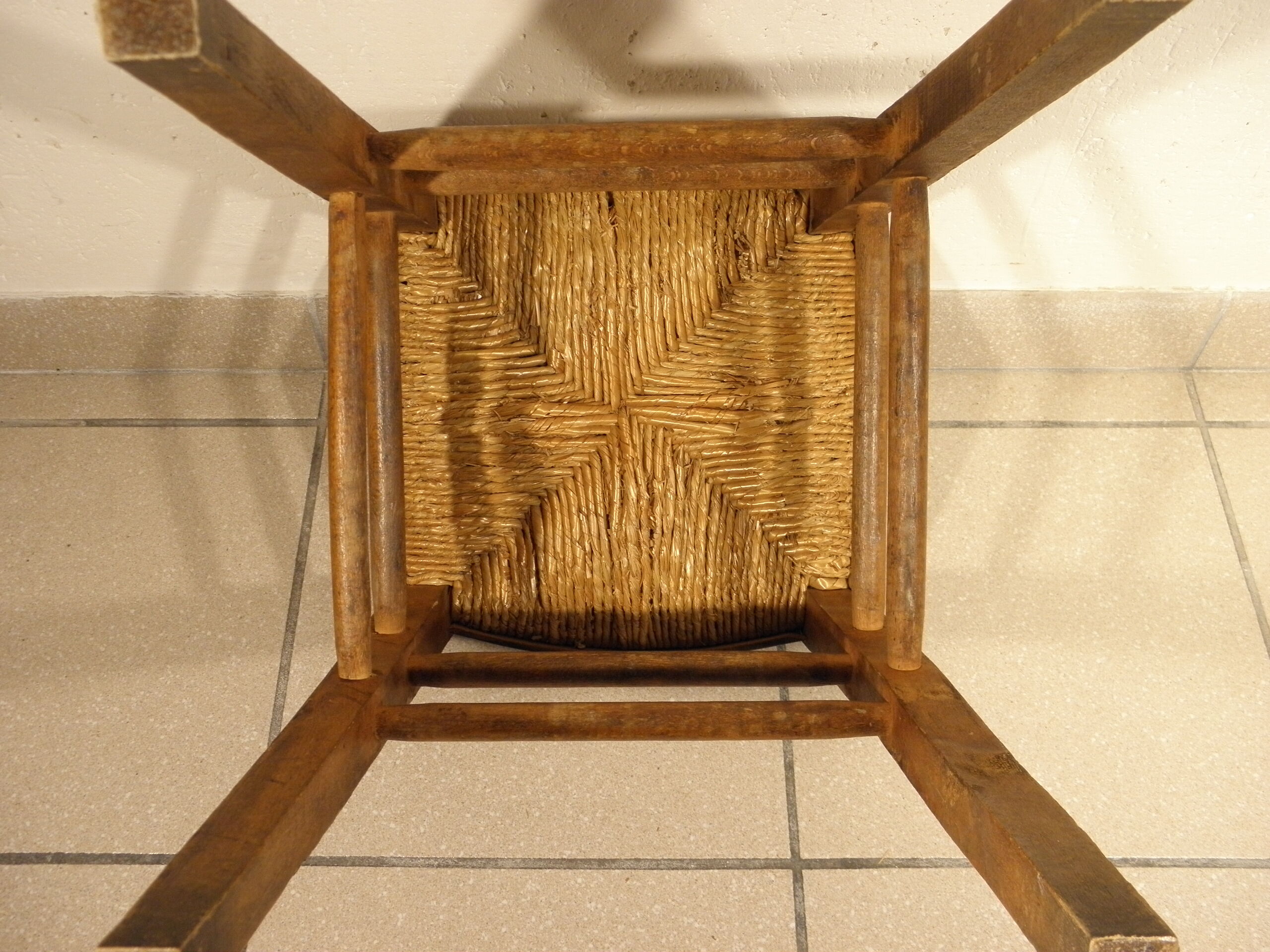 Wood and straw farm stool