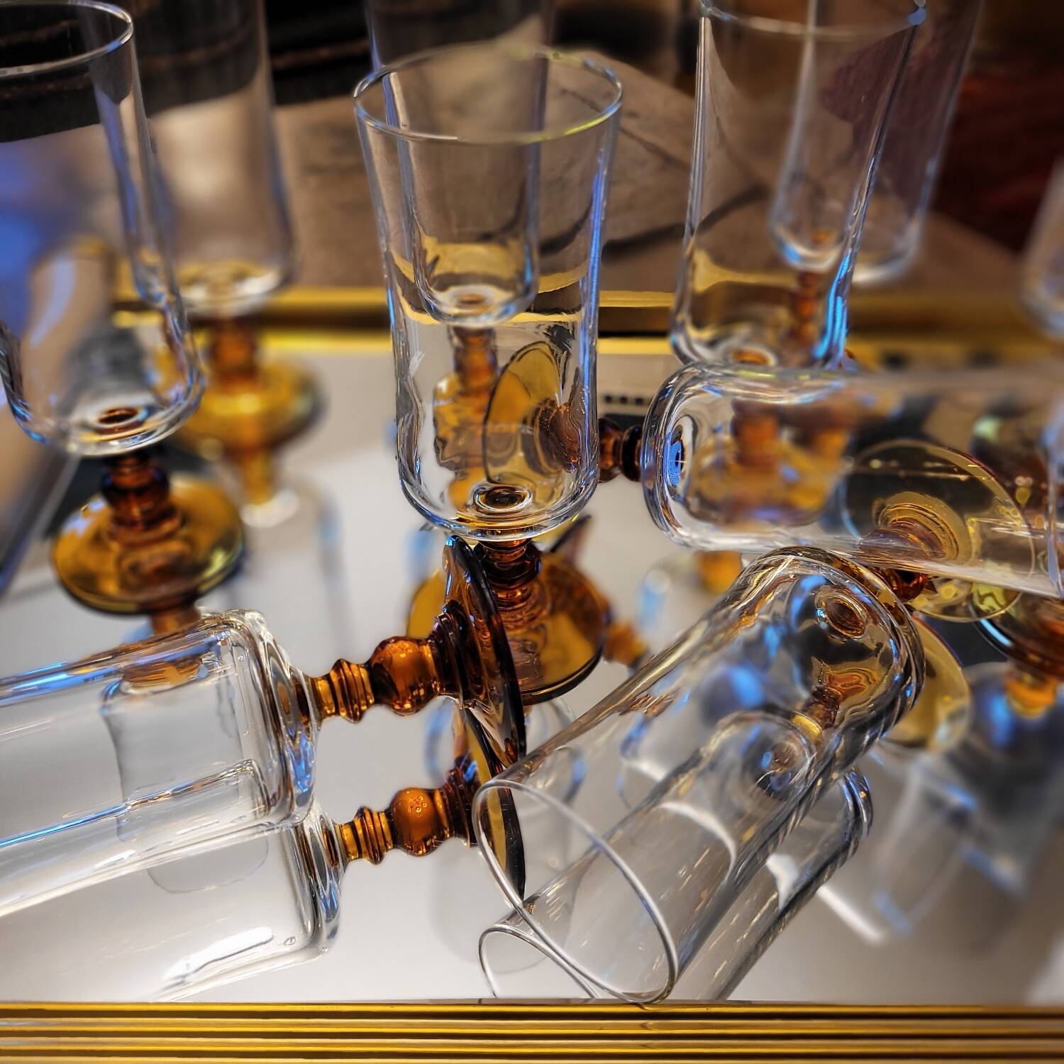 12 amber-stemmed flutes, 70s