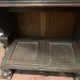 Console table in carved oak XX century