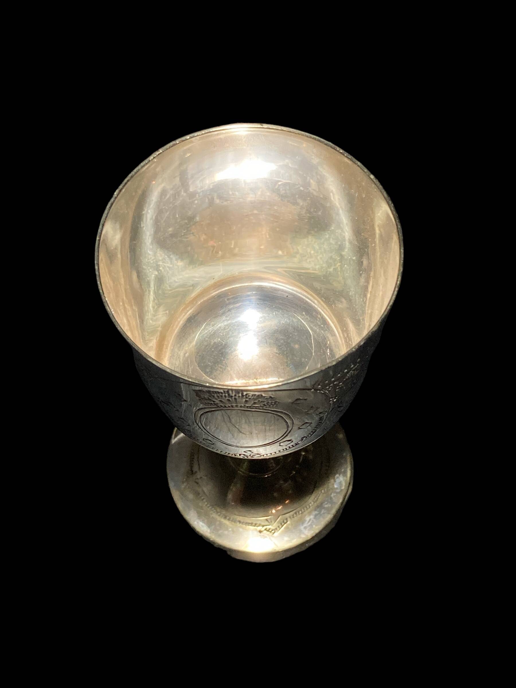 Set of six gold metal glasses