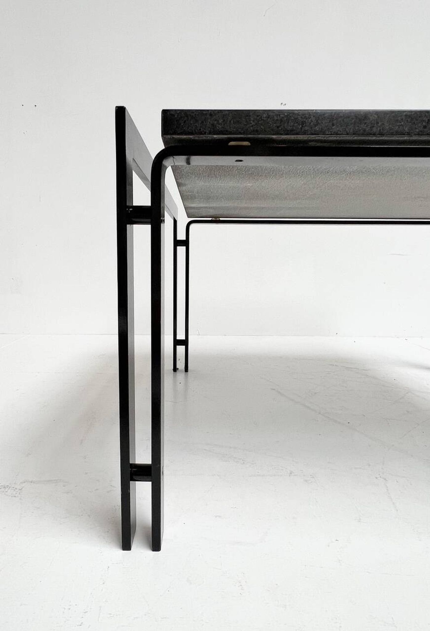 Black granite side table or coffee table from the 1980’s