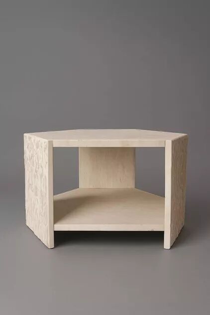 Hexagonal side table in travertine by Claude Berraldacci. France.