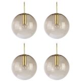 Smoked glass and brass ball pendant light Limburg, Germany, 1970s