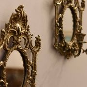 Paire de appliques murales en laiton antique avec miroir
