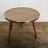 Guerdon small round coffee table brown tripode door plant