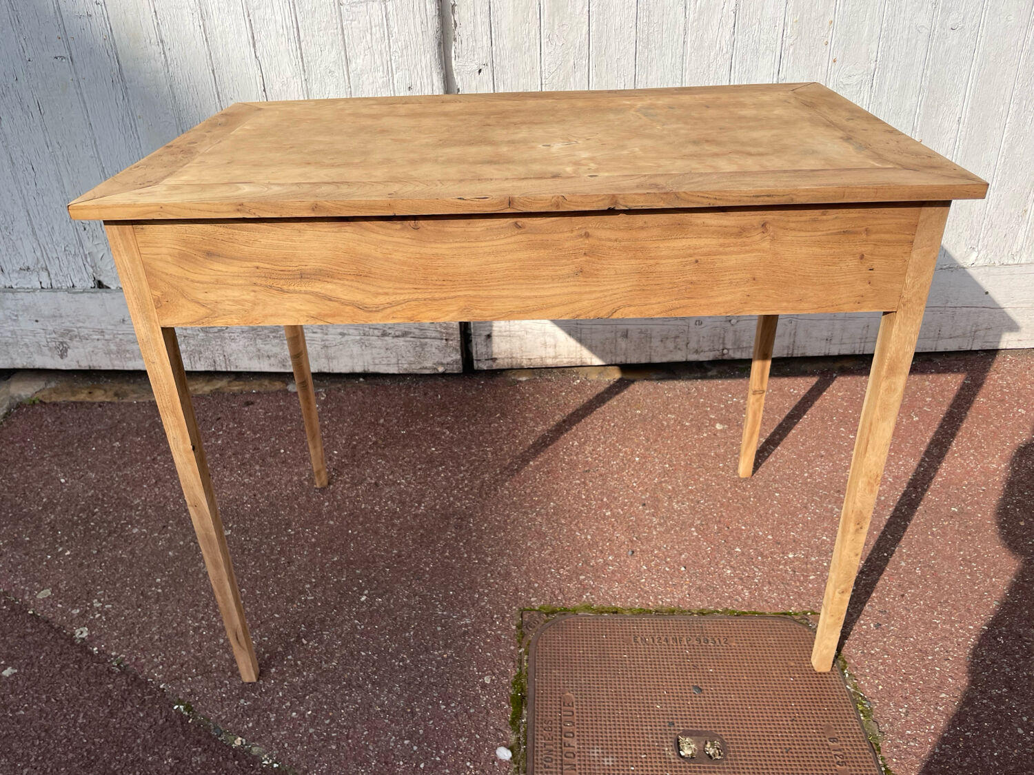 Vintage wooden desk with two drawers.