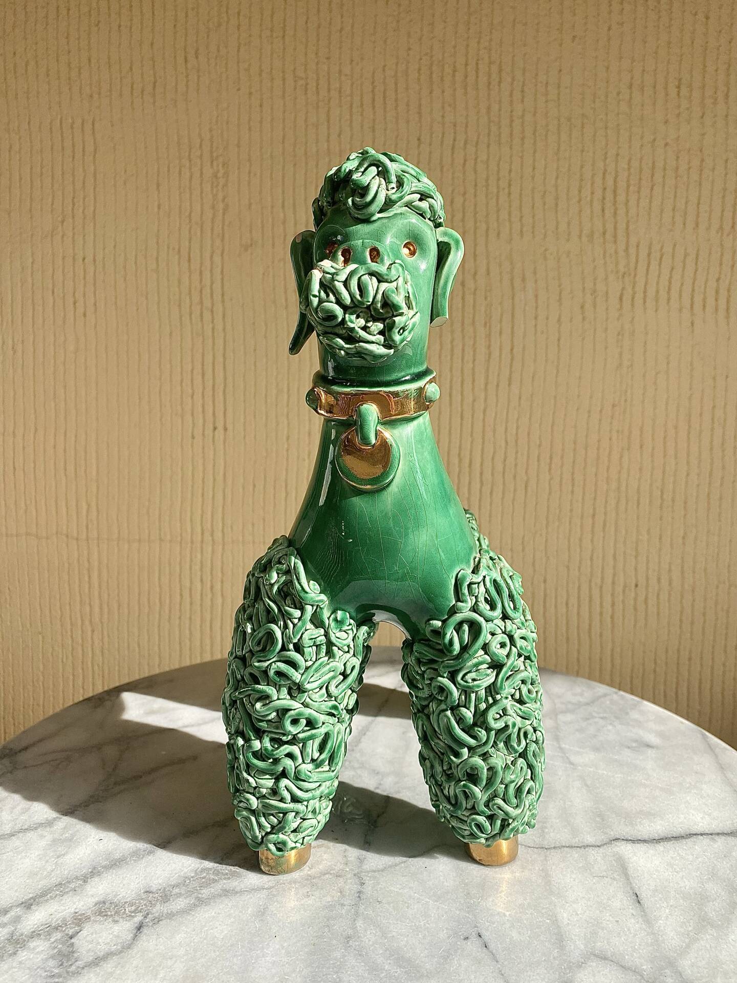 Large green glazed ceramic spaghetti poodle from the 60s.