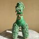 Large green glazed ceramic spaghetti poodle from the 60s.