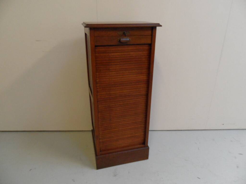 Antique filing cabinet with roller shutter