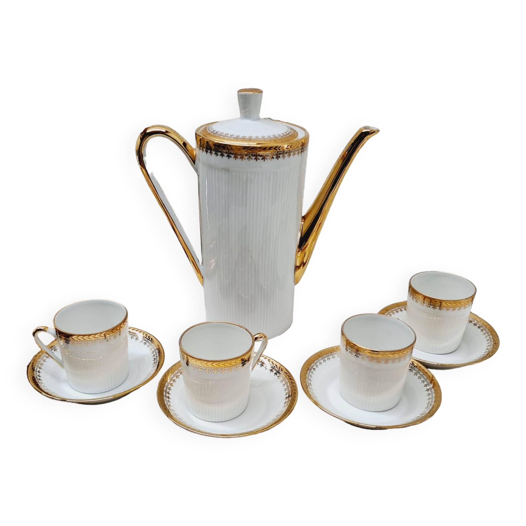 White and gold porcelain coffee maker and cups