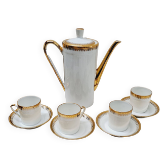 White and gold porcelain coffee maker and cups