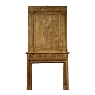 Woodwork fireplace and its trumeau Louis XVI period in natural wood