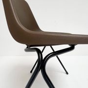 Brown and black set of 6 Polyprop chairs on a metal frame. The Polyprop cha