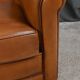 Paire de fauteuils club en cuir