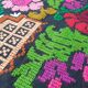 Brown wool rug with colorful boho flowers 142x196cm