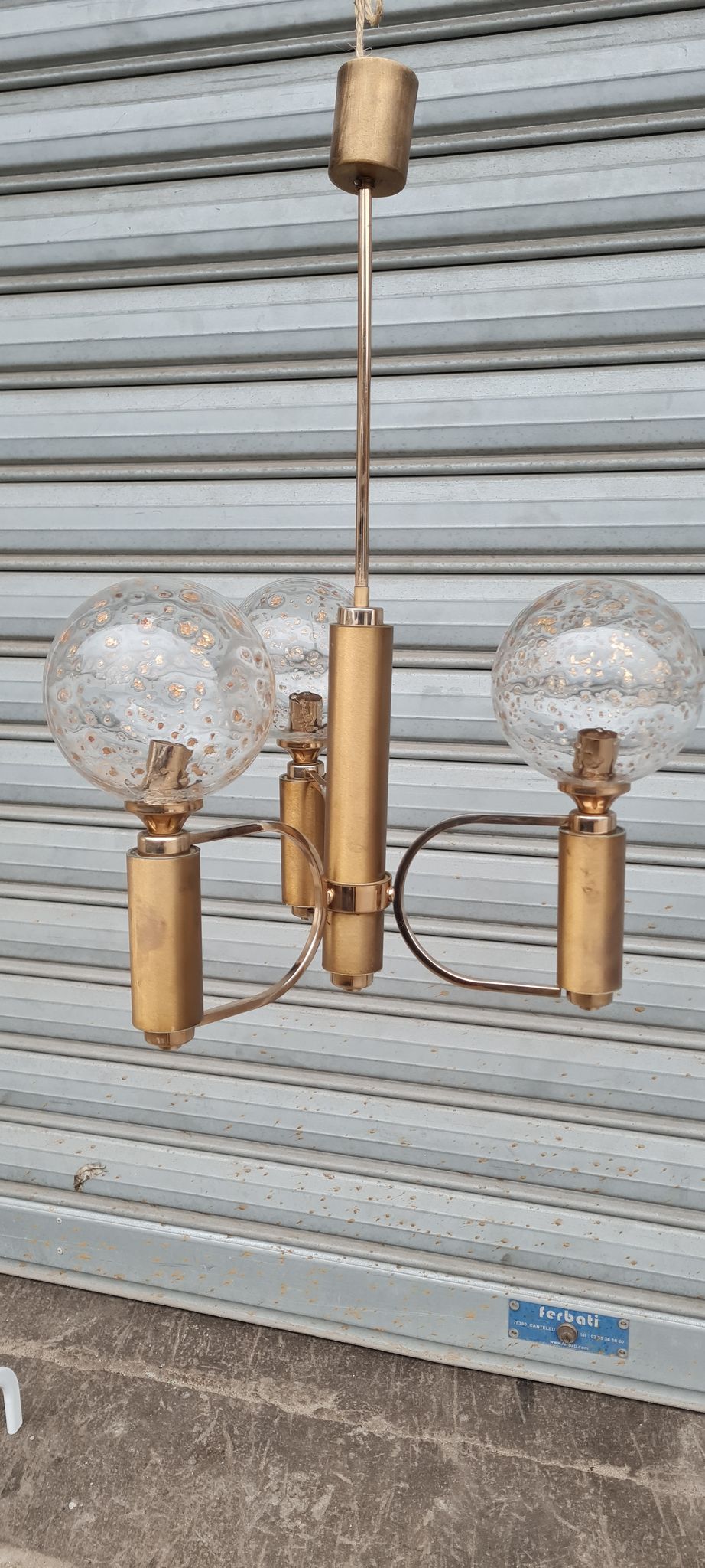 Brass and blown glass chandelier inlaid with gold