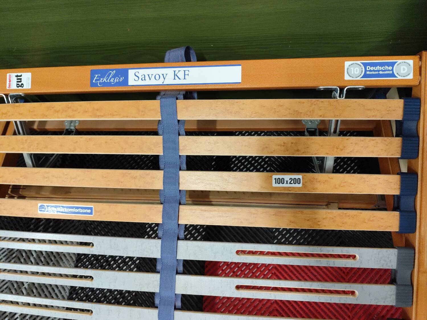 Vintage king-size bed with headboard furniture and built-in radio.