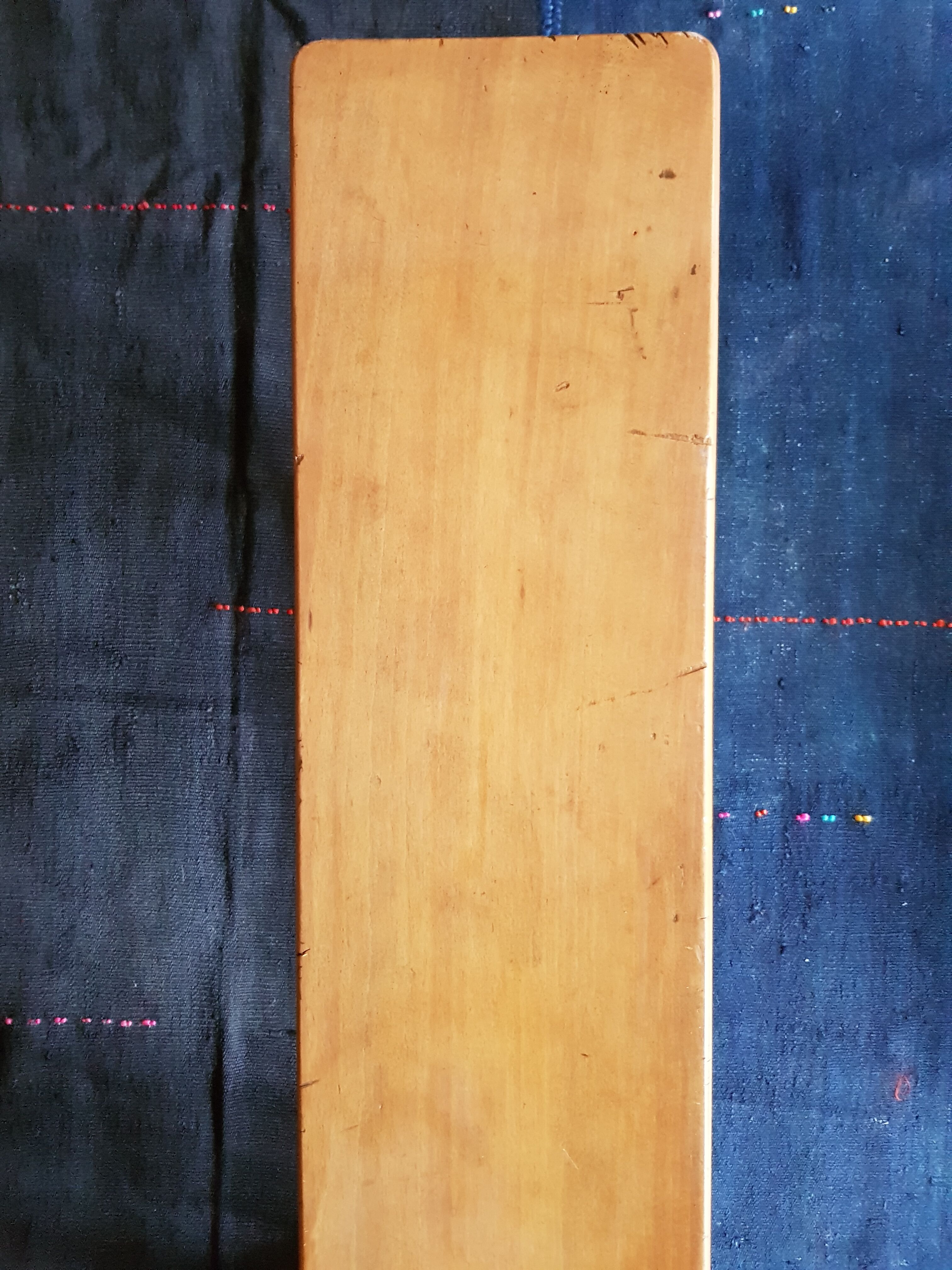 Varnished wooden bench