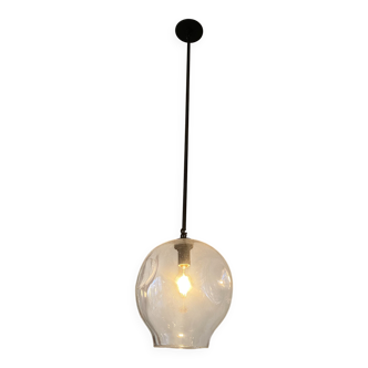 Suspension design by Lindsey Adelman studio in oil-rubbed bronze and clear glass.