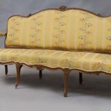 Natural wood canapé, moulded and carved, late 19th to early 20th century.