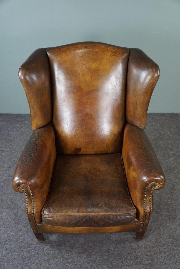 Patinated sheepskin armchair