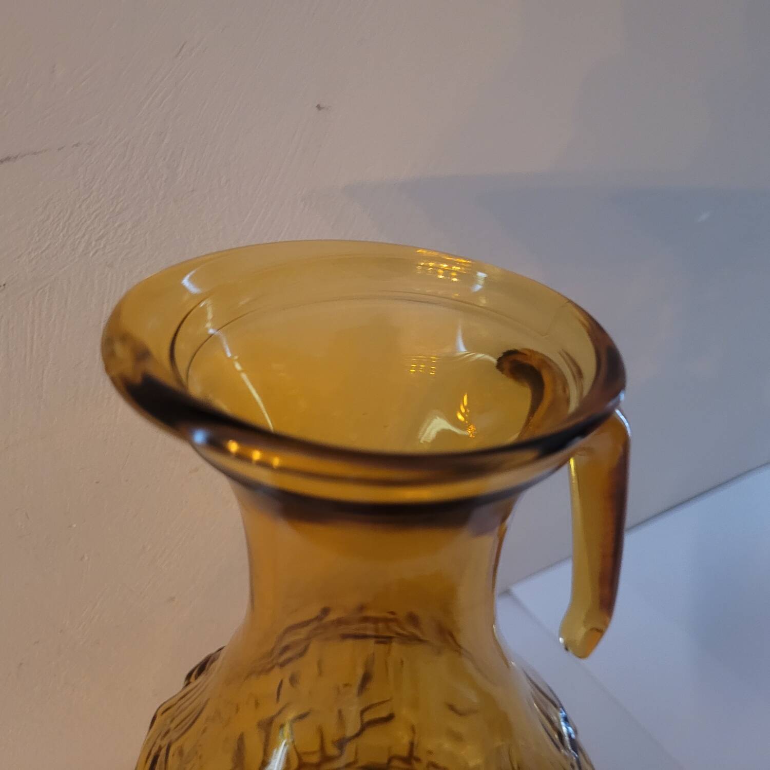 Amber relief glass pitcher. 1970s