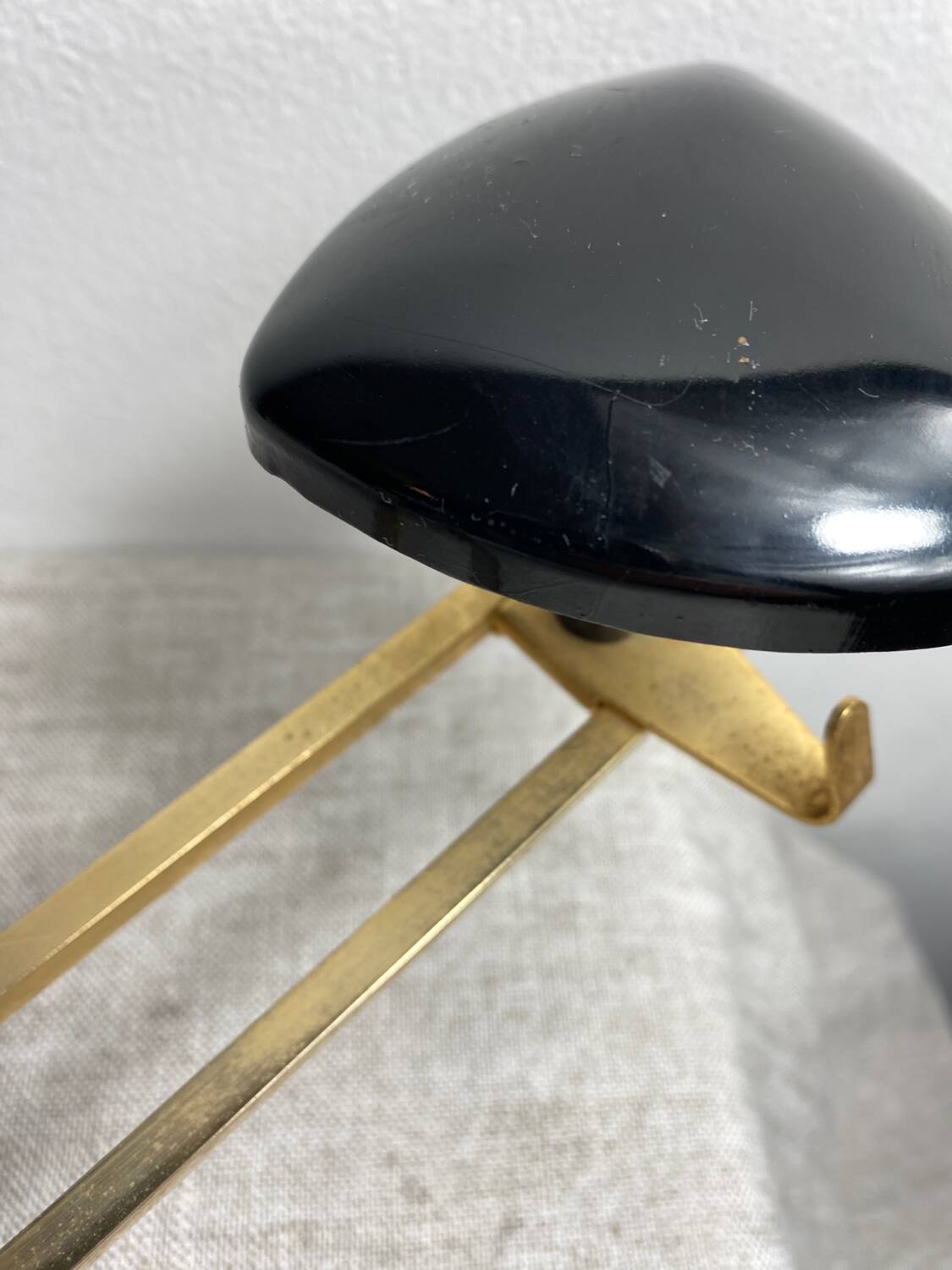 Wall-mounted coat rack with 3 hooks from the 1960s.