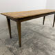 Old farmhouse table with tapered legs, late 19th to early 20th century.