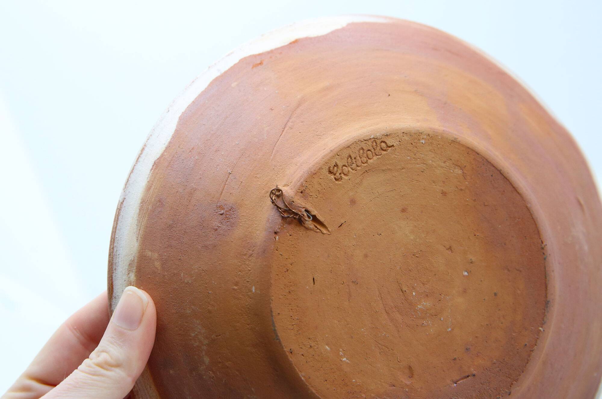 Handmade plate with moon and sun in Romania