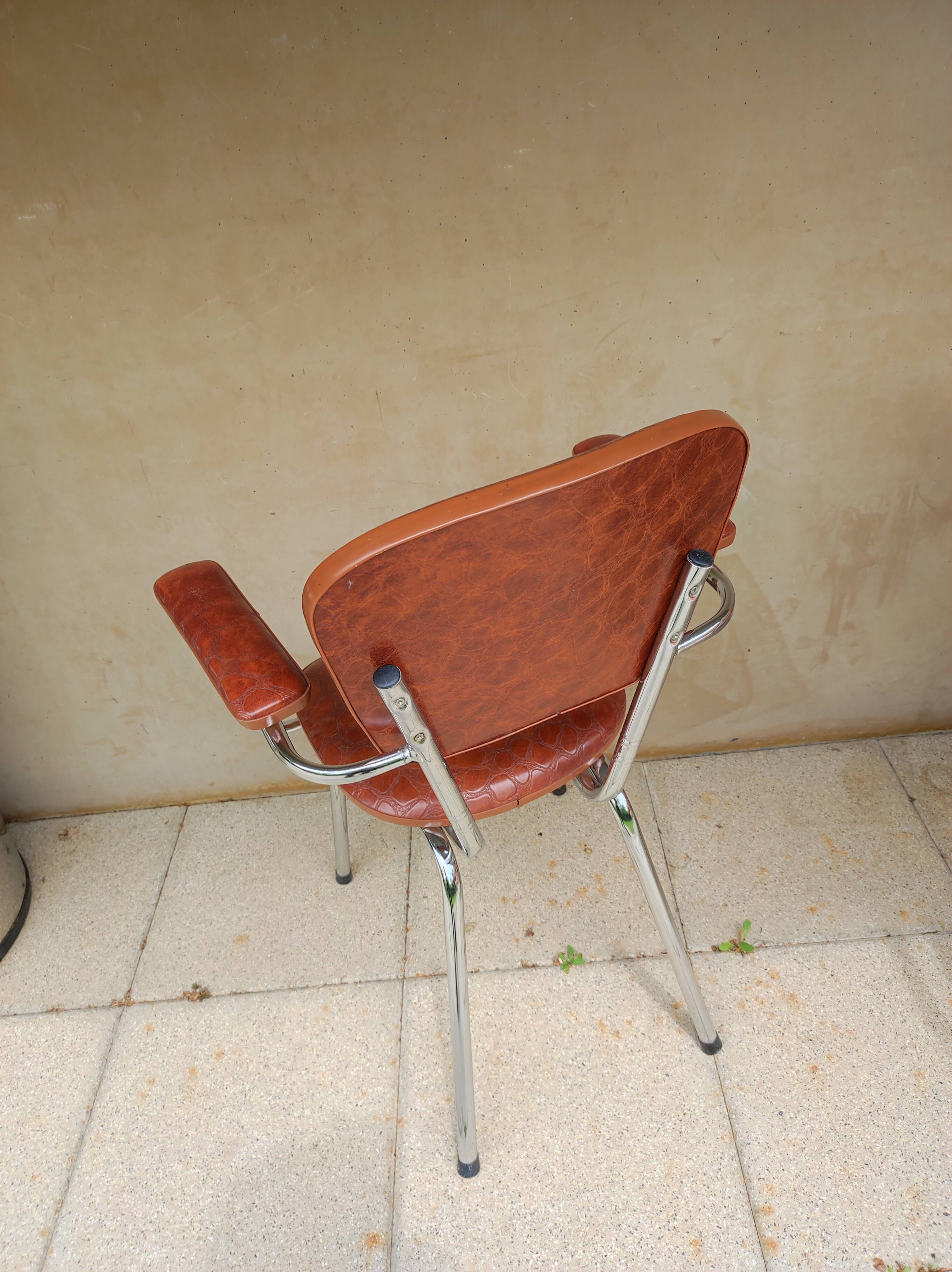 Stainless steel skaï armrest chair from 1958