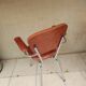 Stainless steel skaï armrest chair from 1958