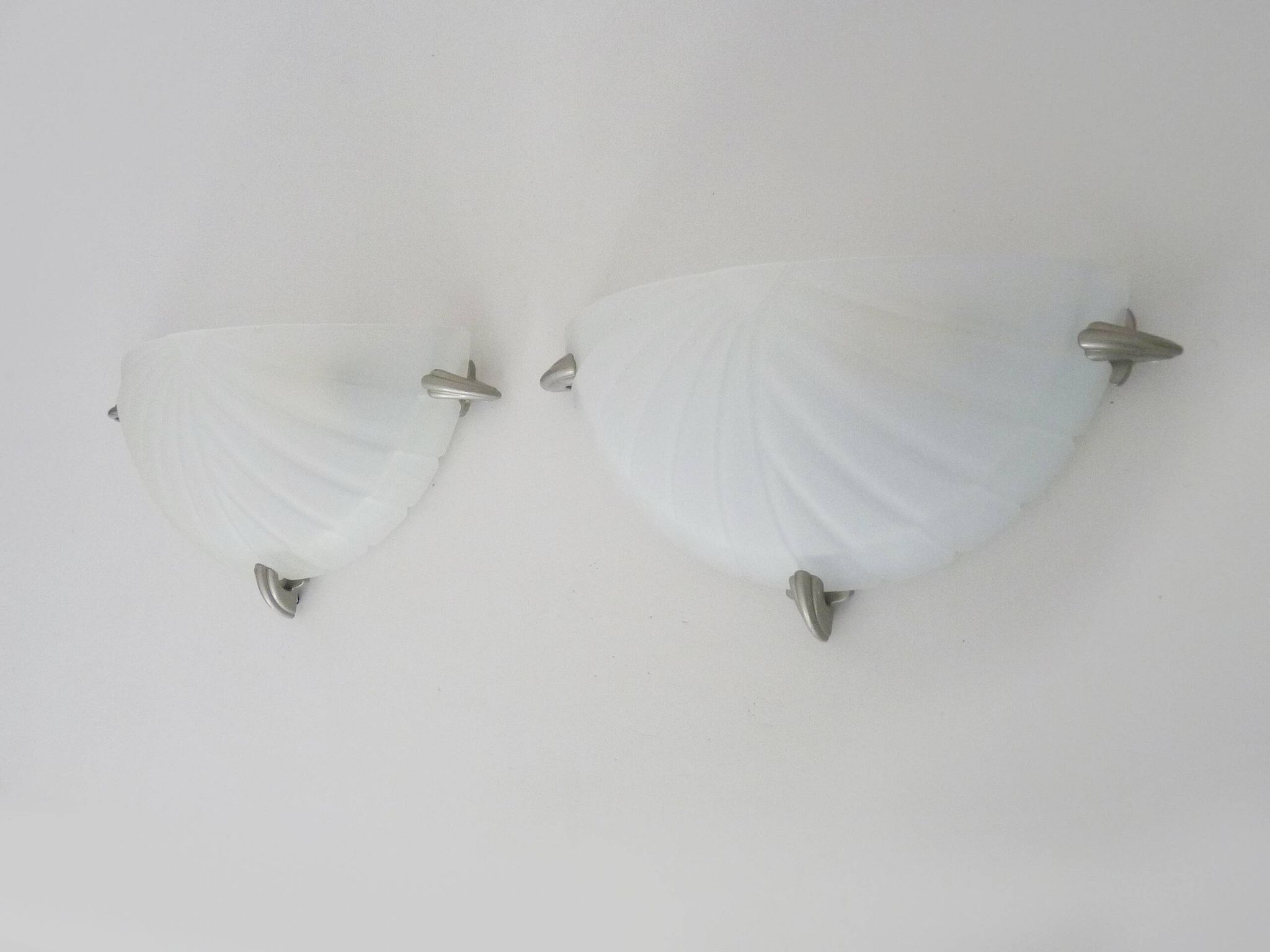 Pair of half-moon wall lights from the 1980s in Italy