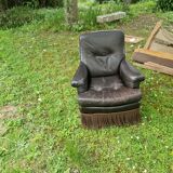 Paire fauteuils en cuir